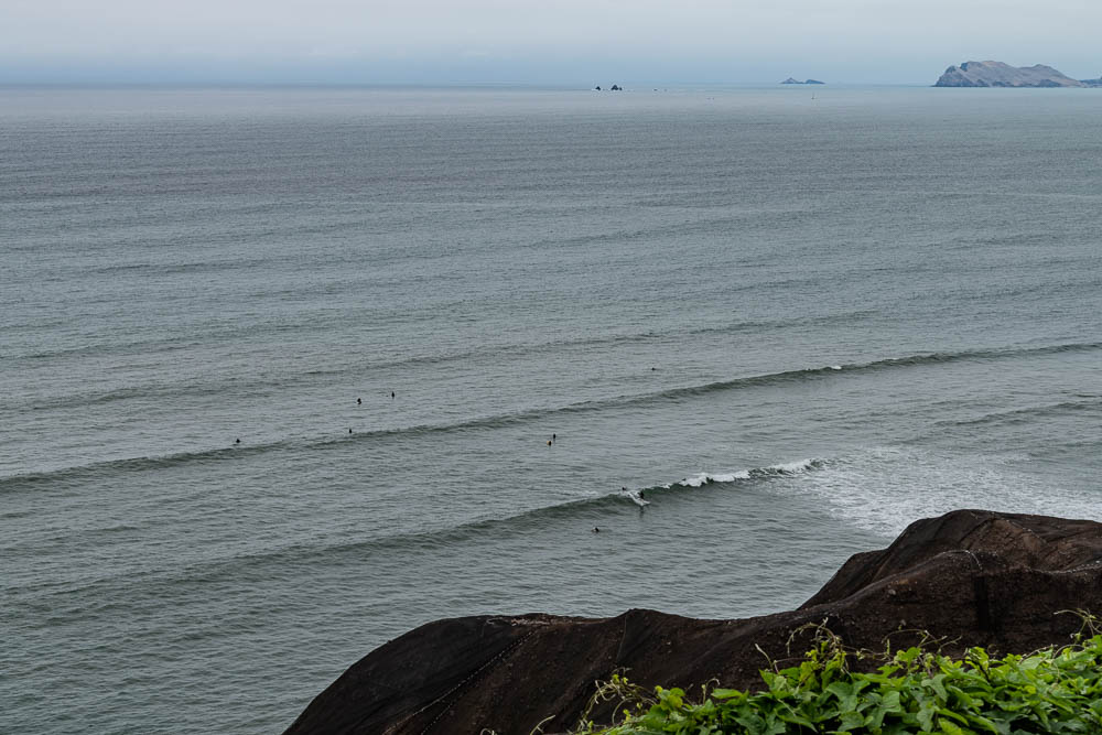 surfers in lima